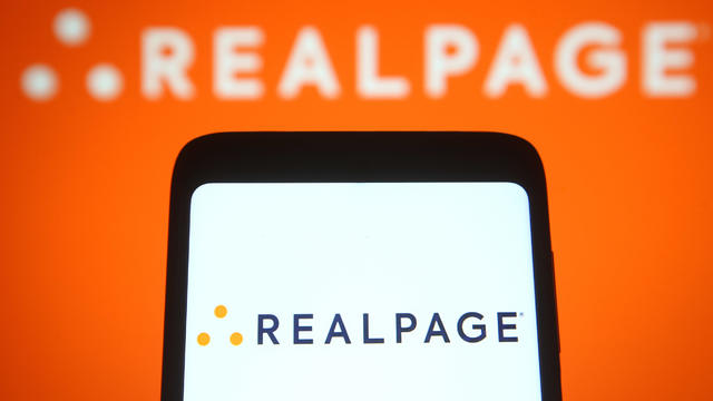 In this photo illustration a RealPage logo of an US software 