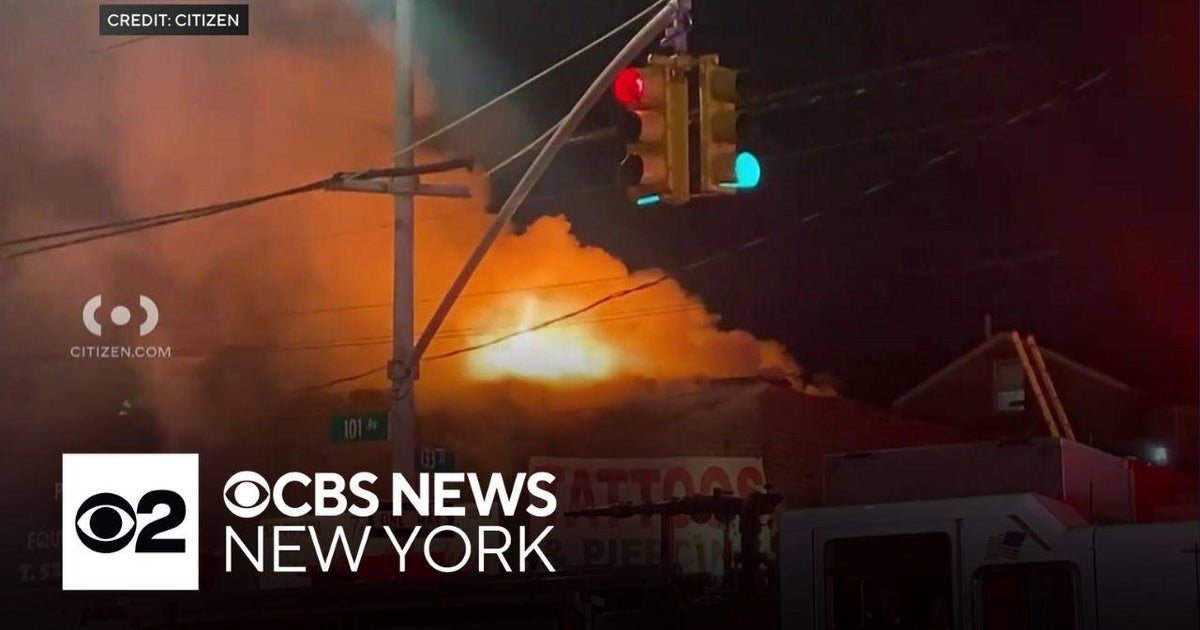 100+ firefighters and EMS respond to building fire in Queens - CBS New York
