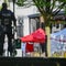 German police say a man turned himself in after deadly festival knife attack