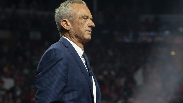 Former Republican presidential candidate Robert F. Kennedy Jr. listens during a campaign rally for Republican presidential nominee, former President Donald Trump at Desert Diamond Arena on August 23, 2024 in Glendale, Arizona. 