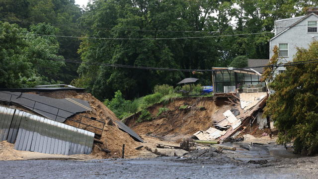 Flooding from heavy rains collapses Mill Pond Dam and six houses in Stony Brook, New York 