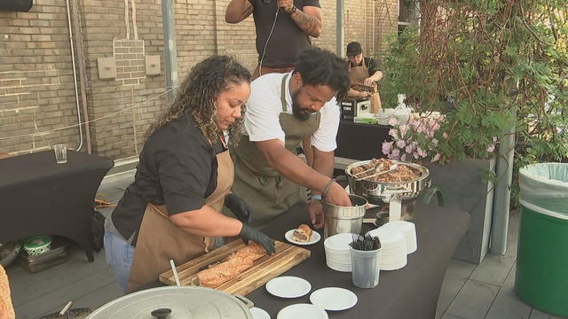 Chefs work during the A Night Out event at the Bok Bar rooftop 