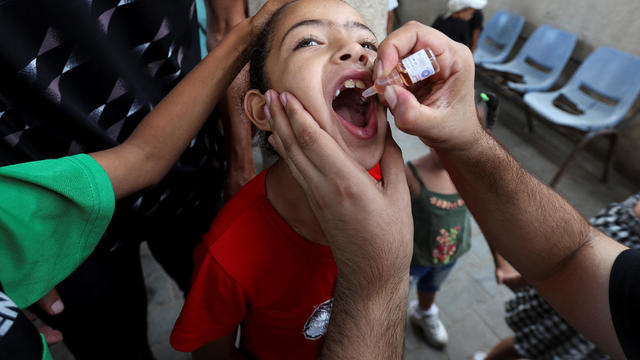 Palestinian children are vaccinated against polio, in Deir Al-Balah in the central Gaza Strip 