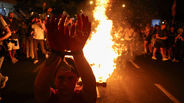 People rally to protest against the government and to show support for the hostages who were kidnapped during the deadly October 7 attack, in Tel Aviv 