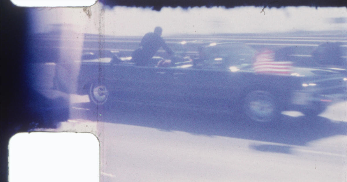 Newly emerged video of JFK's assassination shows a motorcade taking the president to the hospital after the shooting