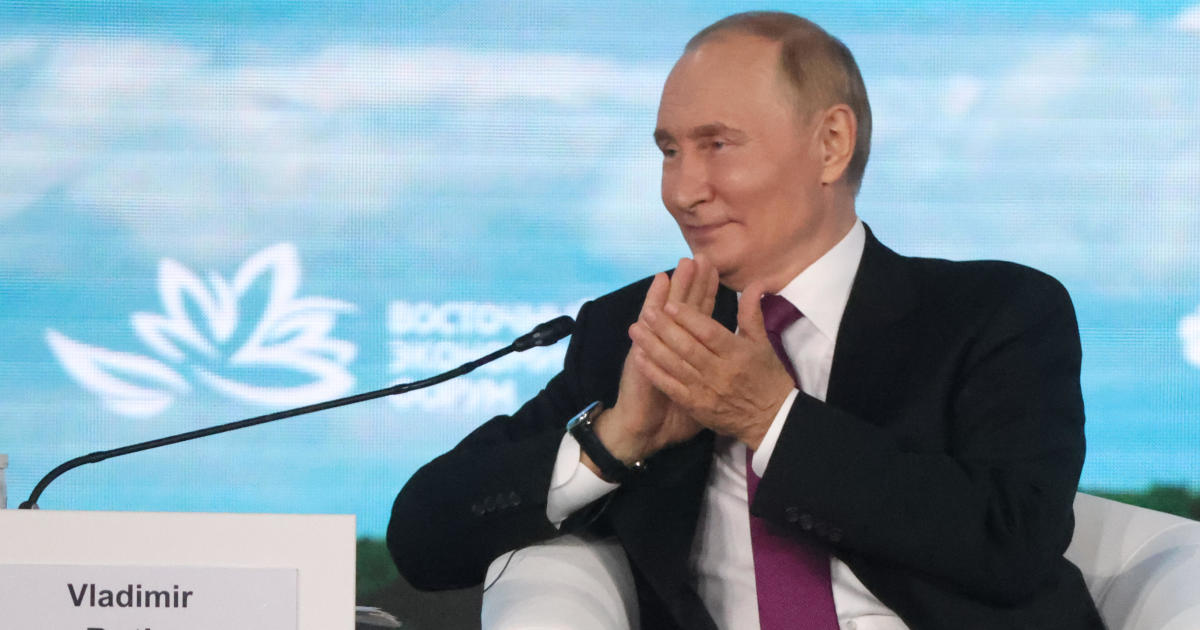 Grinning Vladimir Putin suggests support for Kamala Harris as U.S. accuses Russia of election interference