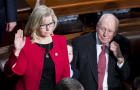 Then-Congresswoman Liz Cheney stands with her dad, former Vice President Dick Cheney, at his house in Virginia after she was ousted from her GOP leadership role, May 12, 2021, McLean, Virginia. 