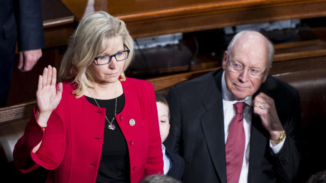 Then-Congresswoman Liz Cheney stands with her dad, former Vice President Dick Cheney, at his house in Virginia after she was ousted from her GOP leadership role, May 12, 2021, McLean, Virginia. 