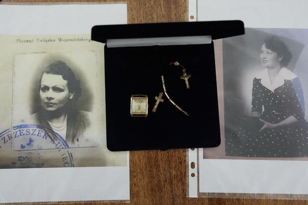 Amber crucifixes and golden jewelry confiscated by Nazi Germans from Stanislawa Wasilewska, pictured in the family photos, who was captured by Nazi forces during the Warsaw Uprising in 1944 and taken to a forced labor camp