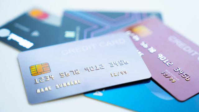 Credit cards stacked on white background 