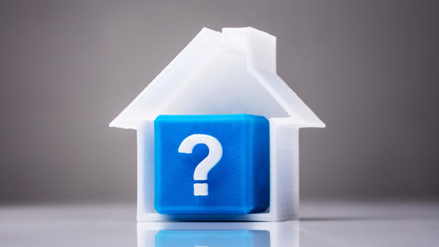 Blue Cube With Question Mark Sign Inside House Model 