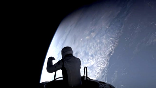 isaccman-seen-outside-capsule.jpg