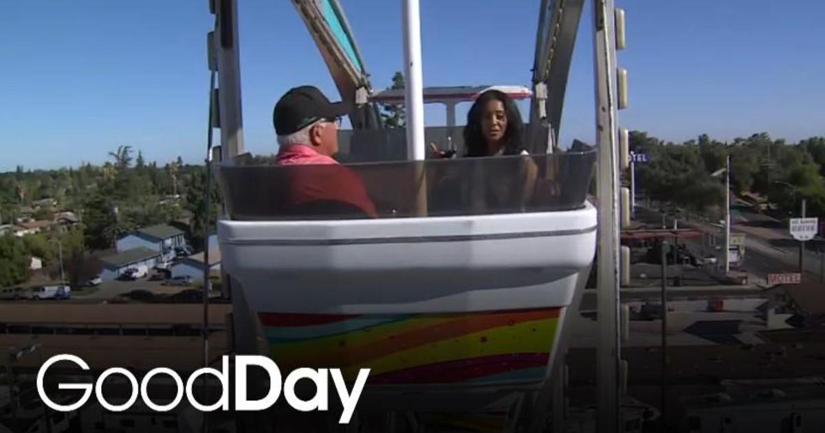 Ashley sips wine on the Ferris wheel at the Lodi Grape Festival! Good