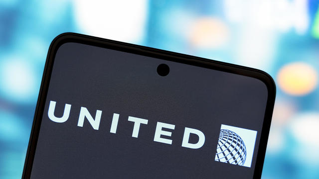 In this photo illustration, the United Airlines logo is 