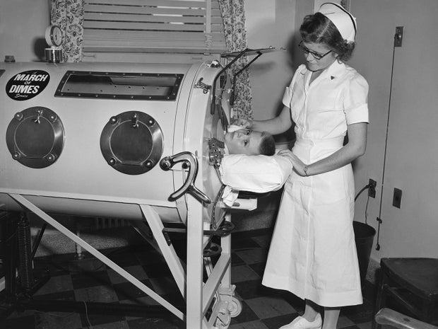 Nurse Cares For Polio Patient