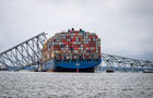 The container ship Dali is seen in the wreckage of Francis Scott Key Bridge almost a week after it hit a structural pier causing a subsequent bridge collapse, April 1, 2024. 