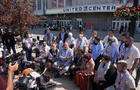 Uncommitted delegates protest in a sit-in outside on the final day of the Democratic National Convention at the United Center on Aug. 22, 2024, in Chicago. 