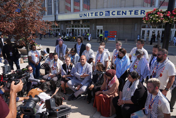 Uncommitted delegates protest in a sit-in outside on the final day of the Democratic National Convention at the United Center on Aug. 22, 2024, in Chicago. 