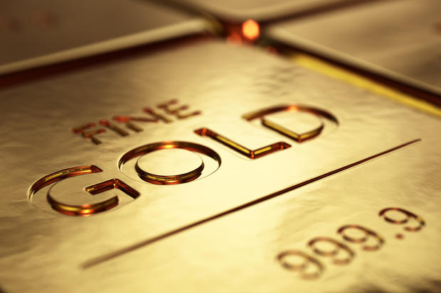 How to invest in gold as inflation drops, according to experts