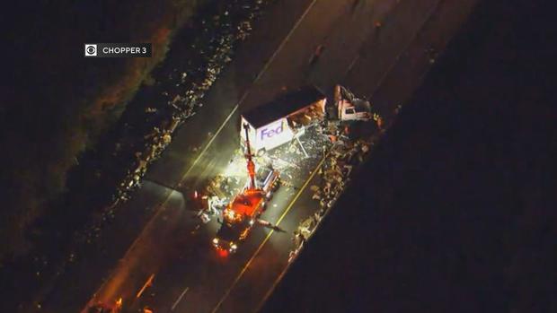 nj-turnpike-accident-today-fedex-truck-packages.jpg 