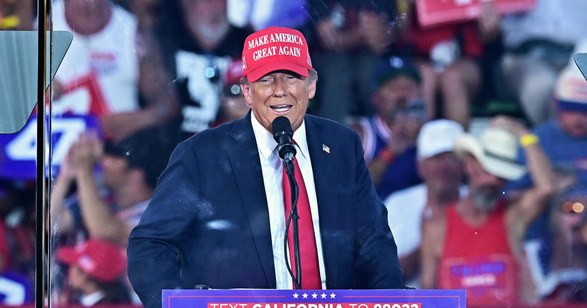 Man arrested with guns near Trump Coachella rally had "homemade" license plate, multiple passports