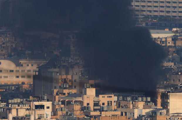 Smoke billows over Beirut's southern suburbs after an Israeli strike 