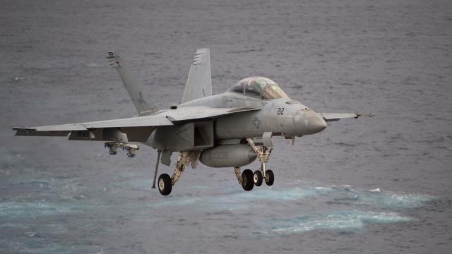 A Boeing EA-18G Growler lands on the deck of the USS George H.W. Bush aircraft carrier in the Atlantic Ocean on Oct. 25, 2017, as the carrier strike group takes part in Operation Bold Alligator, a multinational warfare exercise hosted by the United States 