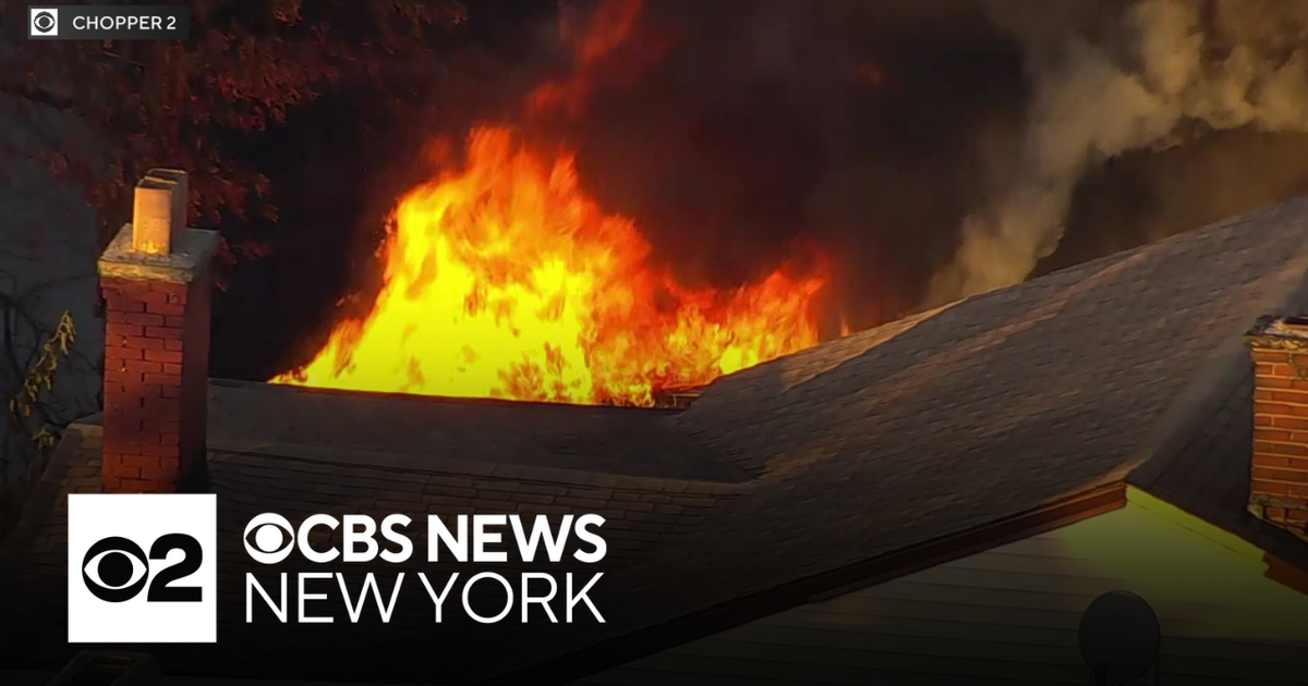 Dozens displaced after fire tears through New Jersey homes - CBS New York