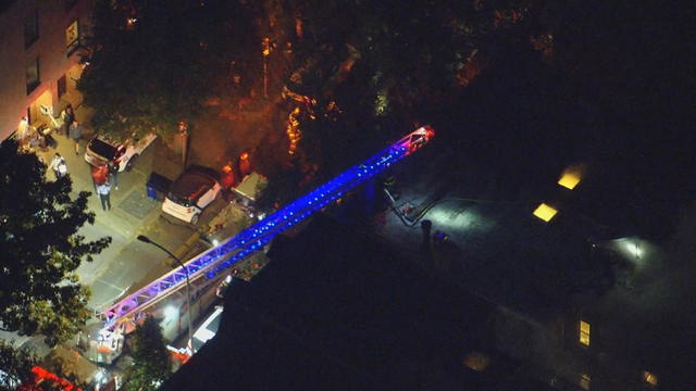 An overhead photo of firefighters working on a fire 