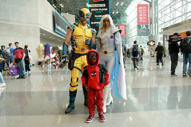 Cosplayers pose as Wolverine, Deadpool and Storm during New York Comic Con 2024 at The Jacob K. Javits Convention Center on October 17, 2024 in New York City.