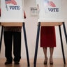Voters voting in polling place 