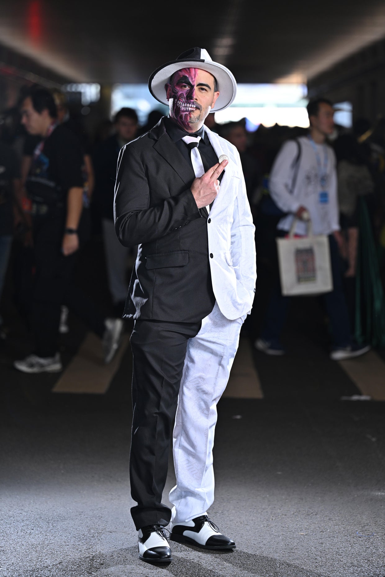 Cosplayer poses as Harvey Dent / Two Face during New York Comic Con at The Jacob K. Javits Convention Center on October 19, 2024 in New York City.