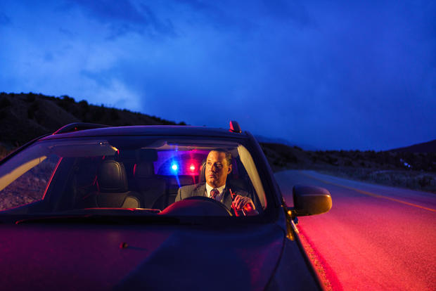 Drunk Driving Man Being Pulled Over by Police 