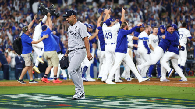 Nestor Cortes #65 of the New York Yankees leaves the field after giving up a walk-off grand slam to Freddie Freeman #5 of the Los Angeles Dodgers in the tenth inning during Game One of the 2024 World Series at Dodger Stadium on October 25, 2024 in Los Angeles, California. 