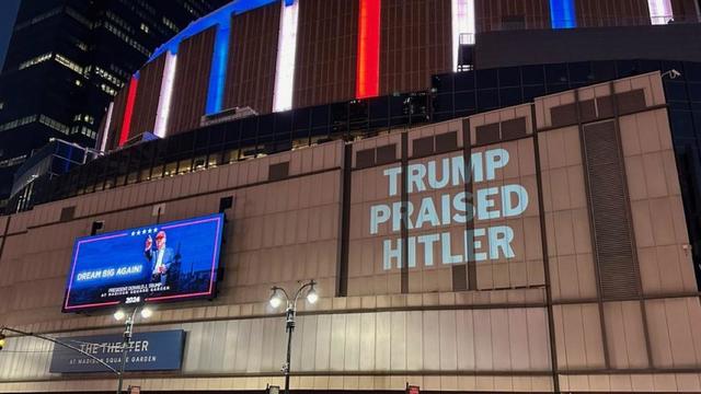 The Democratic National Committee Projects Messages On Trump Tower On The Eve Of The Vice Presidential Debate 