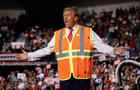 Republican presidential nominee, former President Donald Trump greets supporters during a campaign event at the Resch Center on October 30, 2024 in Green Bay, Wisconsin. 