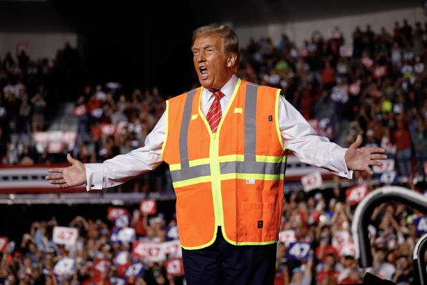 Republican presidential nominee, former President Donald Trump greets supporters during a campaign event at the Resch Center on October 30, 2024 in Green Bay, Wisconsin. 