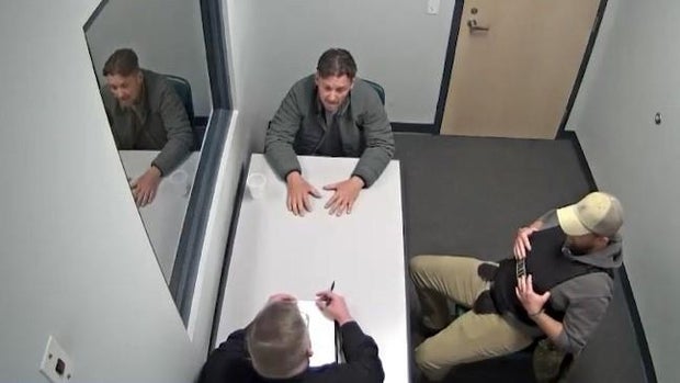 Bobby Tarr talks with detectives.