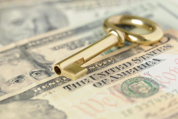 Gold Key to Success over United States Dollars in Cash 