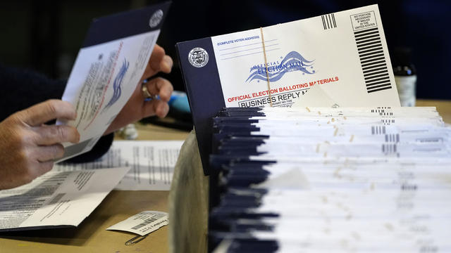 Election worker in Pennsylvania processes mail-in and absentee ballots 