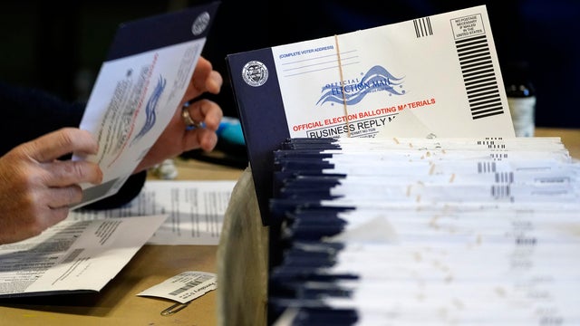 Election worker in Pennsylvania processes mail-in and absentee ballots