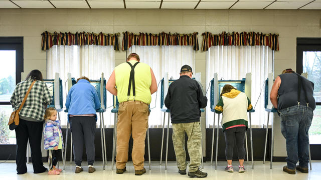 People vote at a polling station at Addison Town Hall in Allenton, Wisconsin, on Election Day, Nov. 5, 2024. 