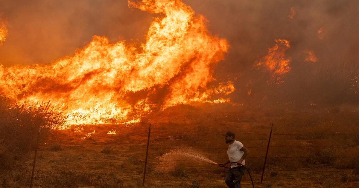 Winds are still driving a mountain fire that has destroyed hundreds of homes in Southern California