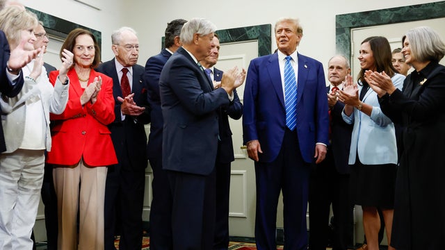 Former President Donald Trump is applauded by Senate Republicans before giving remarks to the press at the National Republican Senatorial Committee building on June 13, 2024 in Washington, DC. 