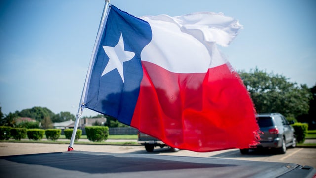 Large group of people forming Texas flag map in The United States of America in social media and community concept on white background. 3d sign symbol of crowd illustration from above 