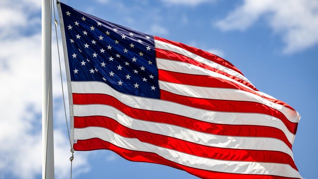 United States flag fluttering in breeze 