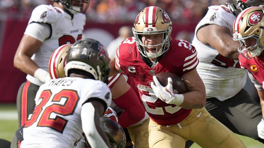 Christian McCaffrey happy to be back on field as he helps 49ers win in ...