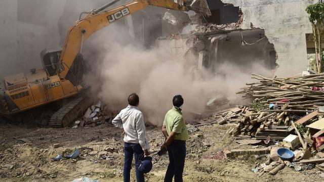 INDIA-POLITICS-RELIGION-BULLDOZER 