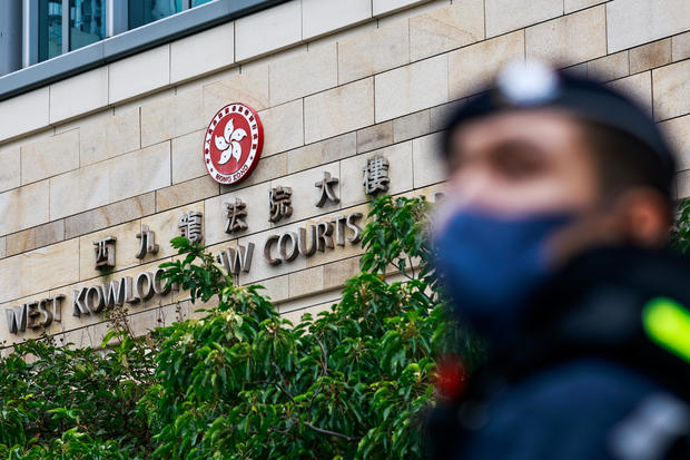 A heavy police presence is seen on the sentencing day for the 45 pro-democracy activists convicted of violating the Beijing-imposed National Security Law, outside a court in Hong Kong, China, on Nov. 19, 2024. 