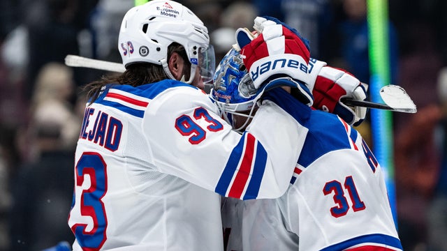 New York Rangers center Mika Zibanejad (93) and goaltender Igor Shesterkin (31) celebrate winning against the Vancouver Canucks after the third period of an NHL game between the New York Rangers and the Vancouver Canucks on Tuesday, November 19, 2024 at Rogers Arena in Vancouver, B.C.
